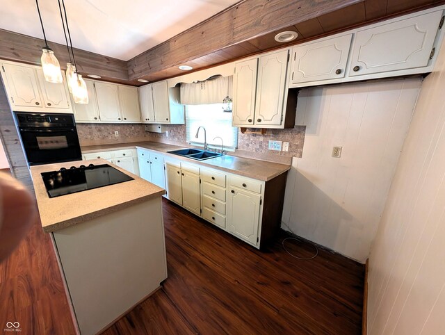 4335 River Rd, Columbus, IN 47203 - kitchen with black appliances, a sink, tasteful backsplash, and dark wood-style flooring