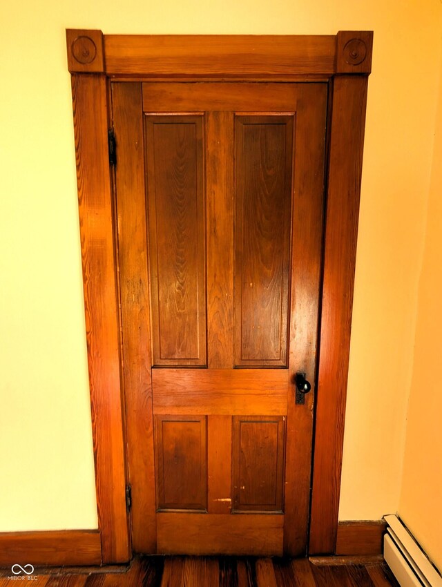 4335 River Rd, Columbus, IN 47203 - detailed view of a baseboard heating unit and baseboards