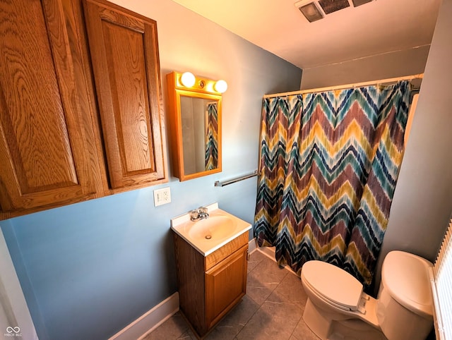 4335 River Rd, Columbus, IN 47203 - bathroom featuring toilet, vanity, tile patterned flooring, a shower with shower curtain, and baseboards