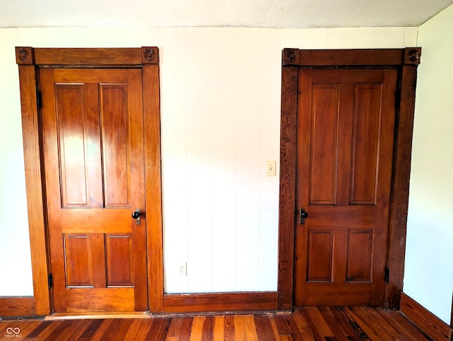 4335 River Rd, Columbus, IN 47203 - unfurnished bedroom with dark wood-type flooring and baseboards