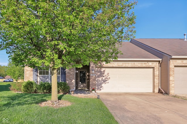 view of front of house with brick siding and an attached garage