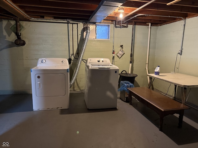 laundry room with washer and dryer and laundry area