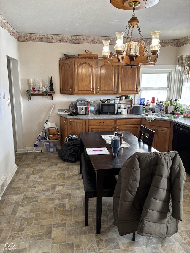 3333 S Sr 9, Greenfield, IN 46140 - kitchen featuring black appliances, brown cabinets, a sink, baseboards, and a chandelier