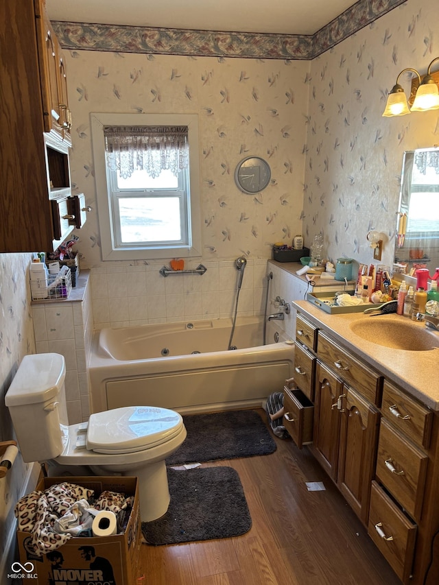 3333 S Sr 9, Greenfield, IN 46140 - bathroom with wood finished floors, wallpapered walls, a bath, toilet, and vanity