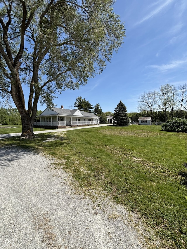 3333 S Sr 9, Greenfield, IN 46140 - view of green lawn with covered porch