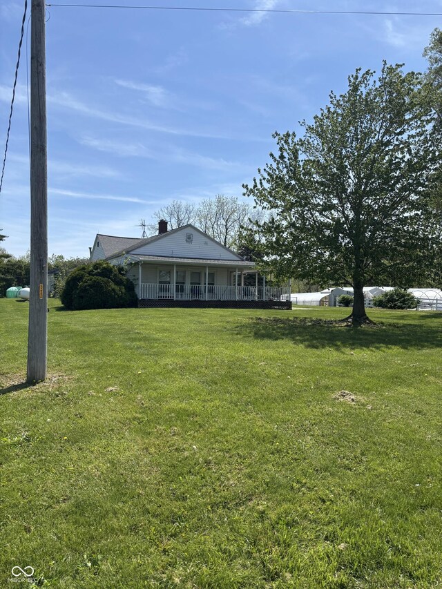 3333 S Sr 9, Greenfield, IN 46140 - view of front facade featuring a front lawn and a chimney