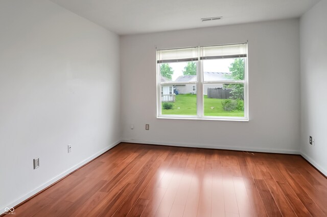 2138 Rossington Ln, Indianapolis, IN 46229 - empty room with wood finished floors and baseboards