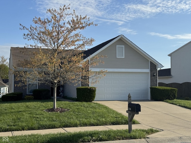2138 Rossington Ln, Indianapolis, IN 46229 - view of front of house featuring concrete driveway, a front lawn, and a garage