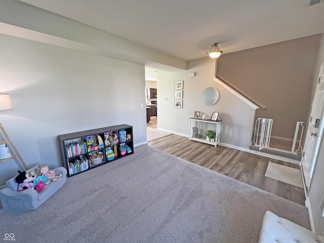 4245 W Fork Dr, Westfield, IN 46062 - rec room featuring wood finished floors, baseboards, and carpet floors
