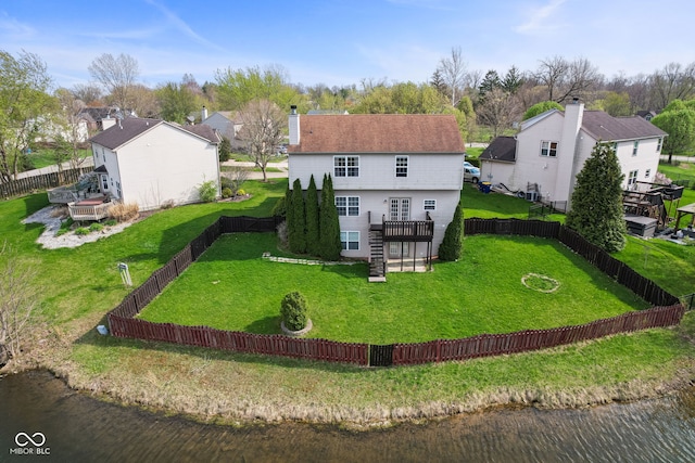 aerial view featuring a residential view and a water view