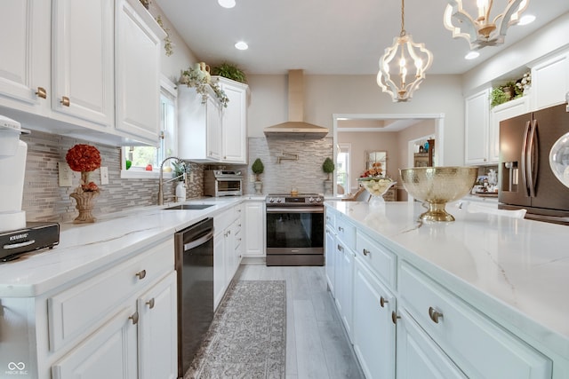 6054 Easy Ln, Indianapolis, IN 46259 - kitchen with appliances with stainless steel finishes, wall chimney exhaust hood, a sink, white cabinetry, and recessed lighting
