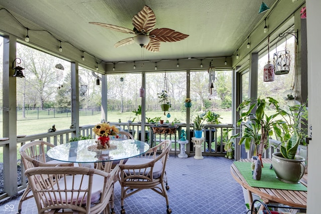 6054 Easy Ln, Indianapolis, IN 46259 - sunroom / solarium with outdoor dining area, ceiling fan, and healthy amount of natural light