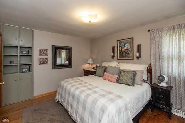 614 Debra Ln, Indianapolis, IN 46217 - bedroom featuring baseboards and wood finished floors