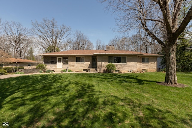 614 Debra Ln, Indianapolis, IN 46217 - single story home featuring stone siding, a front lawn, a chimney, and entry steps