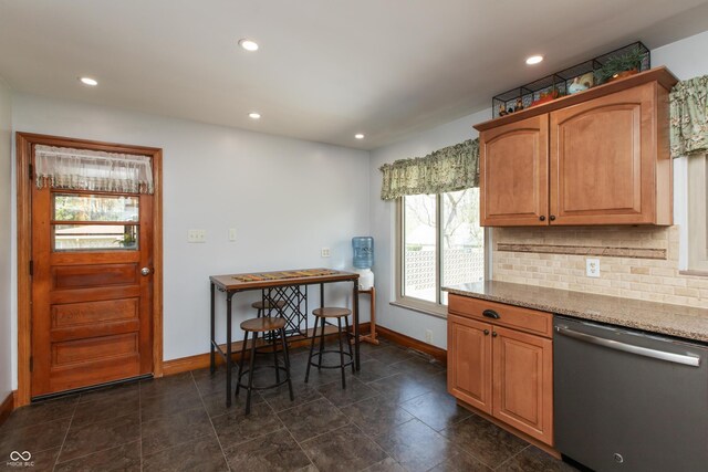 614 Debra Ln, Indianapolis, IN 46217 - kitchen featuring stainless steel dishwasher, tasteful backsplash, baseboards, light stone countertops, and recessed lighting
