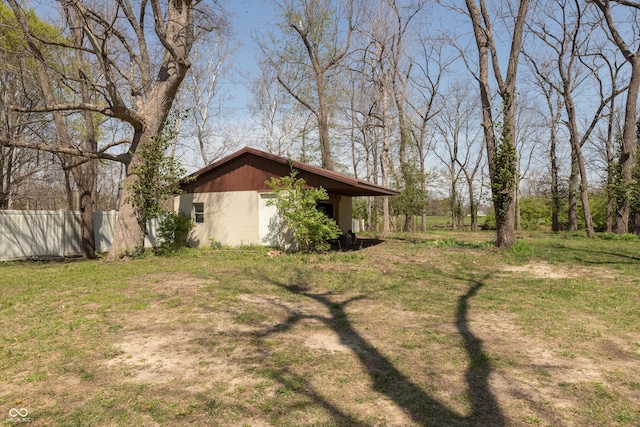 614 Debra Ln, Indianapolis, IN 46217 - view of yard with fence and an outbuilding
