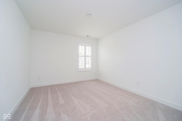 8654 Tripp Rd, Pendleton, IN 46064 - unfurnished room featuring light colored carpet and baseboards