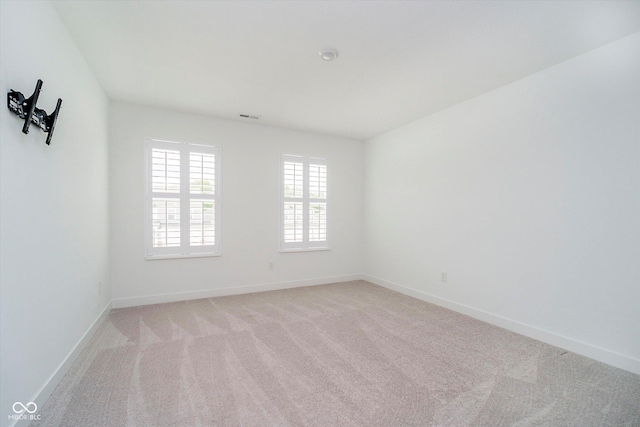 8654 Tripp Rd, Pendleton, IN 46064 - empty room featuring light carpet and baseboards