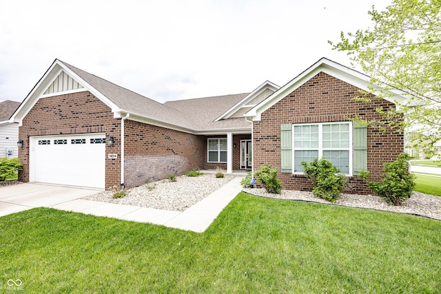 ranch-style home featuring brick siding, an attached garage, driveway, and a front yard