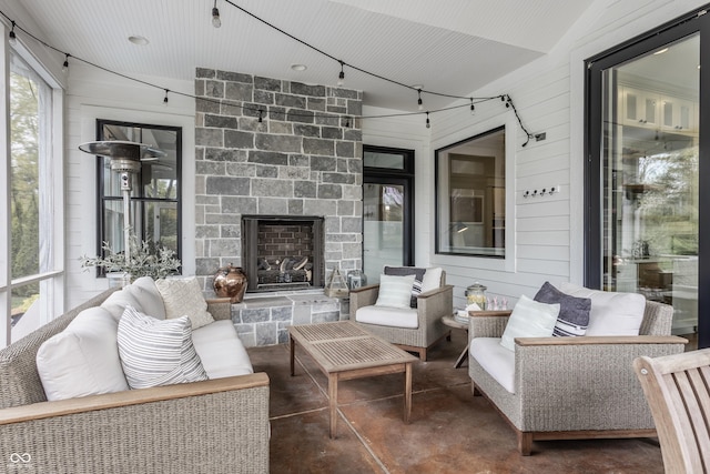 interior space featuring an outdoor living space with a fireplace