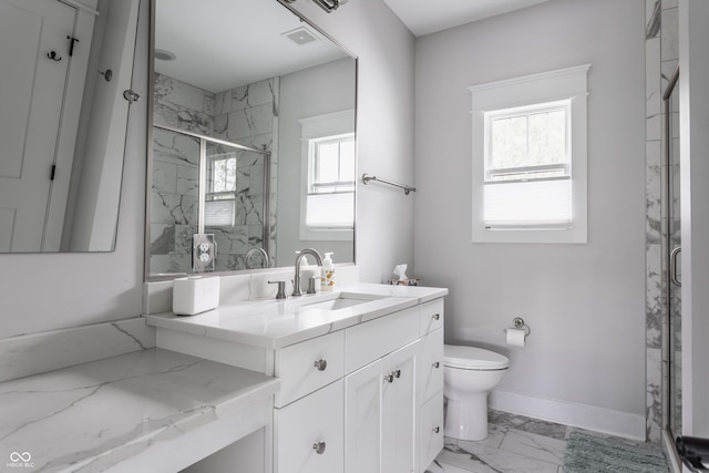 full bath featuring baseboards, a marble finish shower, toilet, vanity, and marble finish floor
