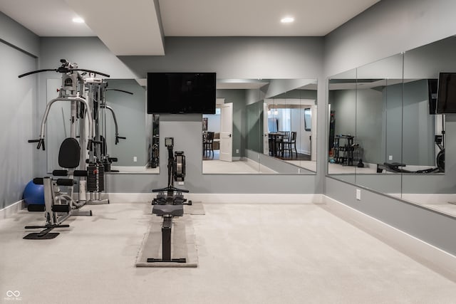 workout room featuring carpet, recessed lighting, and baseboards
