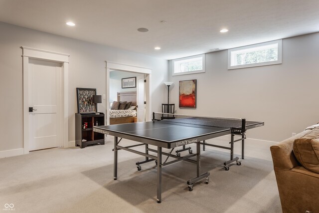 playroom featuring light colored carpet, recessed lighting, and baseboards