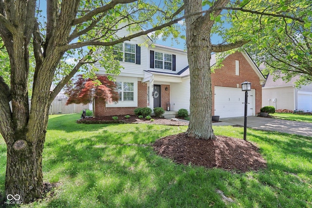 traditional-style house with brick siding, concrete driveway, and a front yard