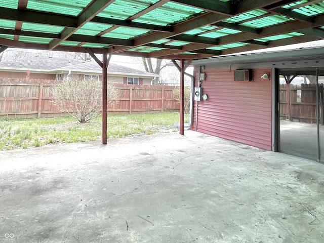 view of patio / terrace featuring a pergola and fence
