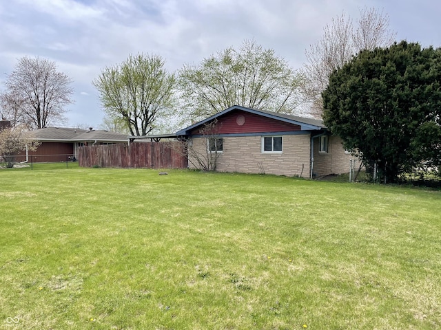 view of yard with fence