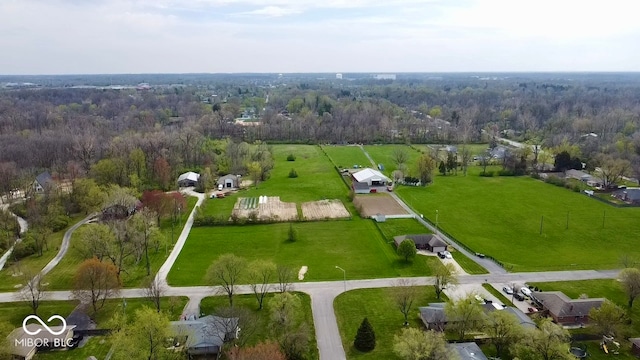 aerial view featuring a forest view