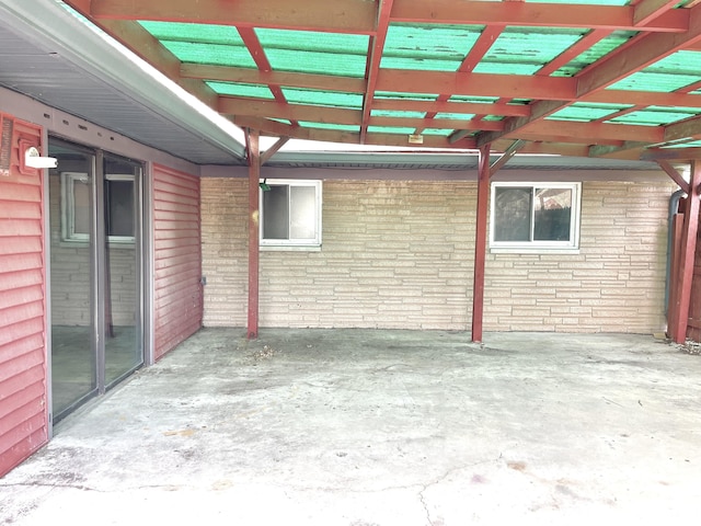 view of patio featuring a carport