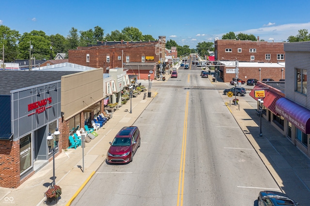 3646 Beach Blvd, Cicero, IN 46034 - view of asphalt road with sidewalks, curbs, and street lights