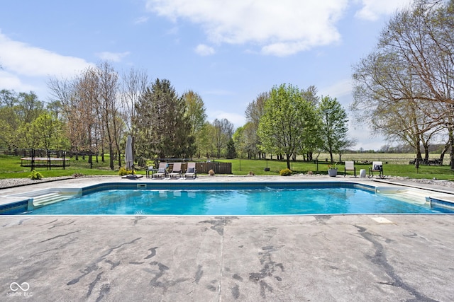 8551 E 300 S, Zionsville, IN 46077 - view of swimming pool featuring a lawn, a patio, a fenced in pool, and fence