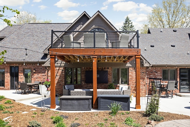 8551 E 300 S, Zionsville, IN 46077 - back of property with a deck, brick siding, a patio area, outdoor lounge area, and outdoor dining space