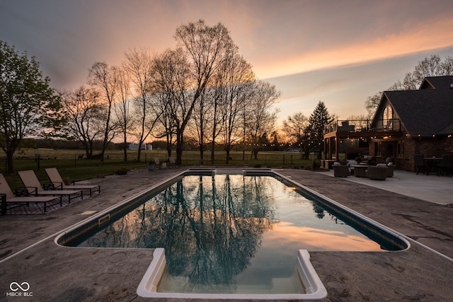 8551 E 300 S, Zionsville, IN 46077 - pool at dusk featuring outdoor lounge area, a patio, and a fenced in pool