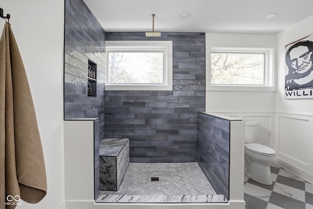 8551 E 300 S, Zionsville, IN 46077 - bathroom featuring wainscoting, a walk in shower, and toilet