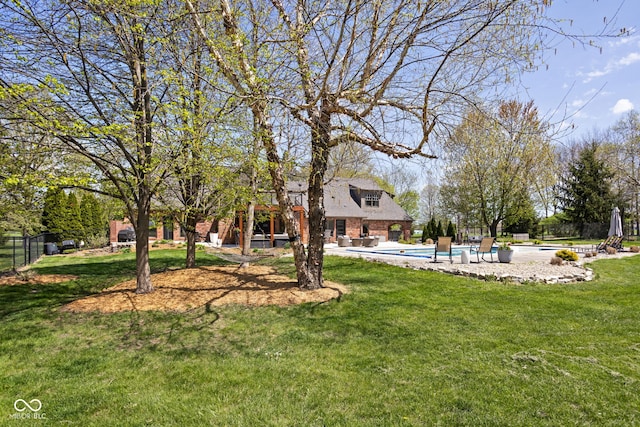 8551 E 300 S, Zionsville, IN 46077 - view of yard featuring fence, a patio area, and an outdoor pool