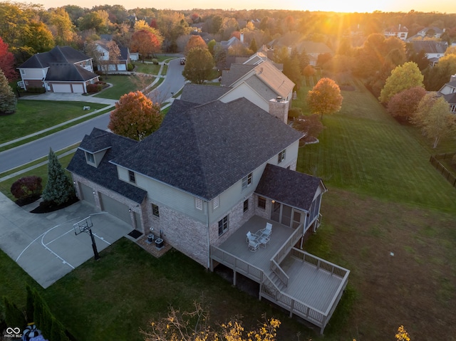 aerial view at dusk with a residential view