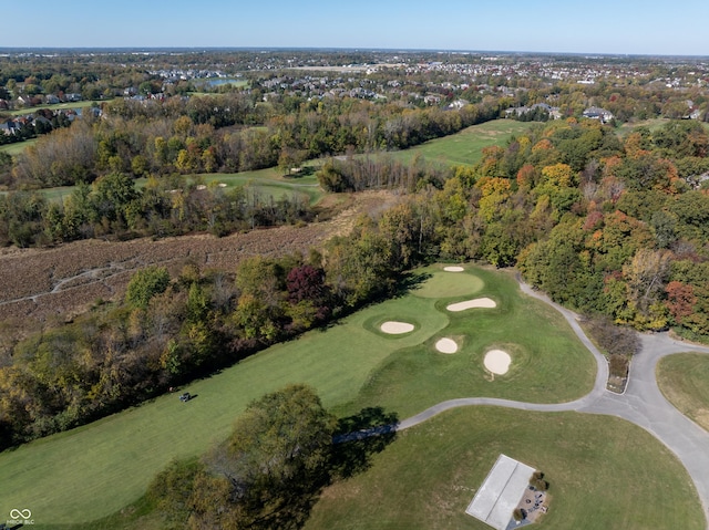 birds eye view of property with golf course view
