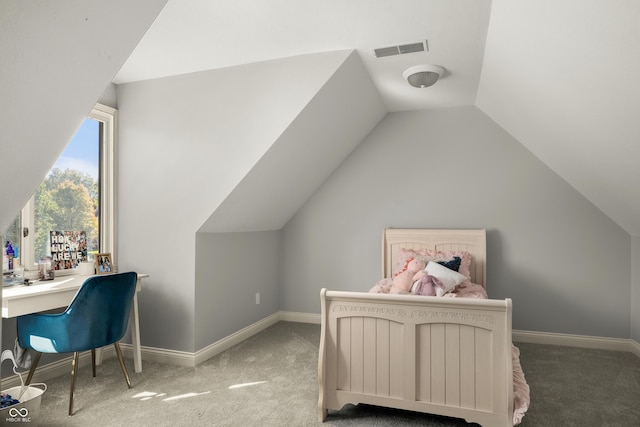 carpeted bedroom with vaulted ceiling, visible vents, and baseboards