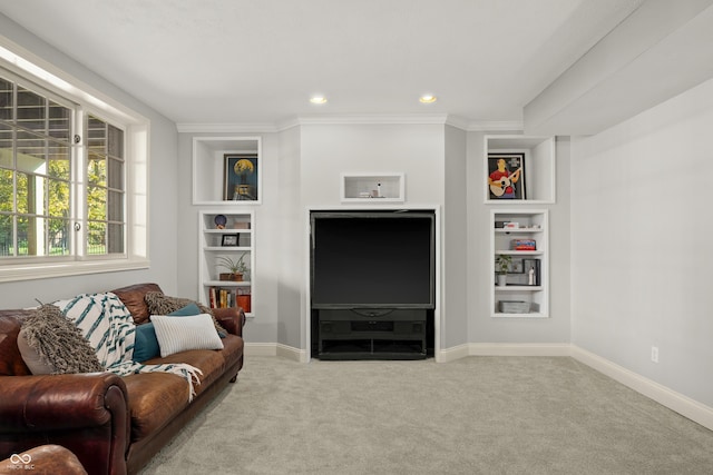 carpeted living room with baseboards, built in features, and recessed lighting