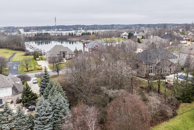 aerial view featuring a water view and a residential view