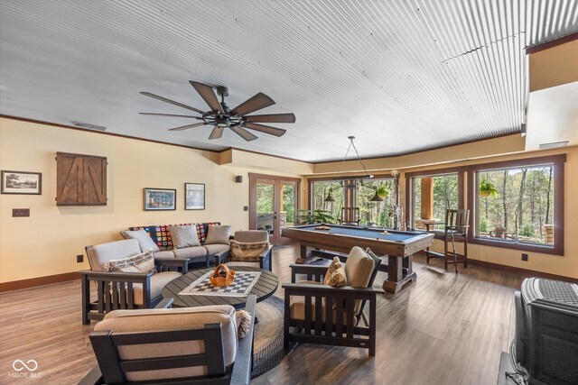 living room with french doors, billiards, baseboards, ceiling fan, and wood finished floors