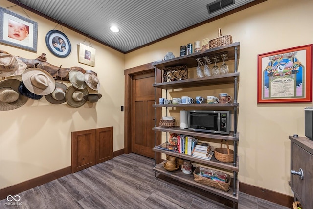 interior space with baseboards, dark wood-style floors, and recessed lighting