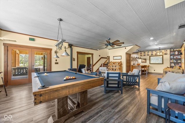 recreation room with french doors, wood finished floors, billiards table, and ceiling fan
