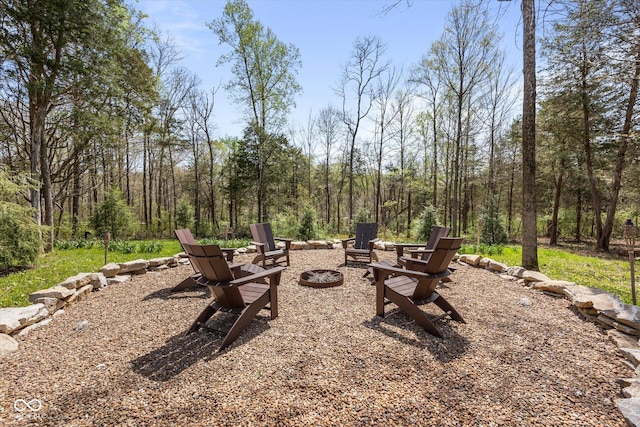 view of patio / terrace with an outdoor fire pit