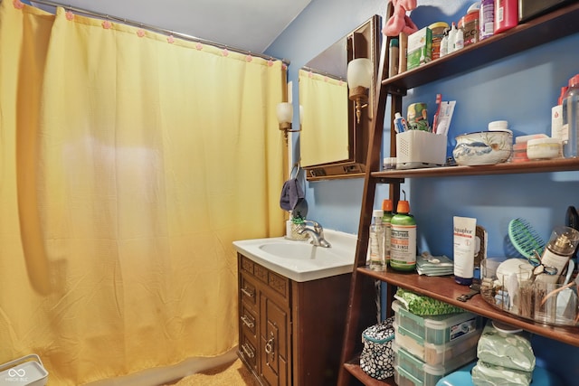 full bath featuring curtained shower and vanity