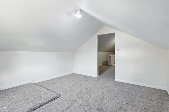 911 W Washington Ave, Shelbyville, IN 46176 - bonus room with ceiling fan, vaulted ceiling, carpet, and baseboards