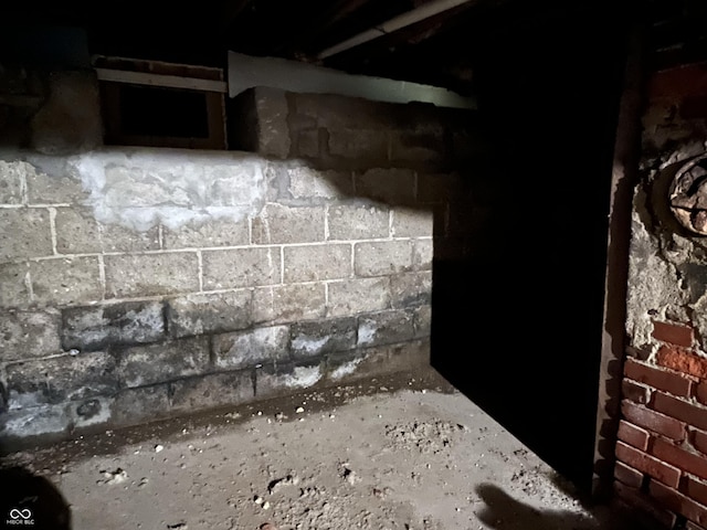 room details featuring concrete block wall